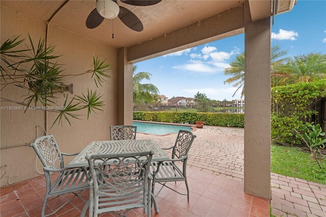 9248 SW 209th Ter, Cutler Bay, FL 33189 - view of patio / terrace featuring ceiling fan, a fenced backyard, and outdoor dining space