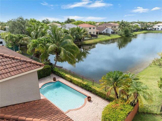 9248 SW 209th Ter, Cutler Bay, FL 33189 - view of pool with a water view, a fenced backyard, and a residential view