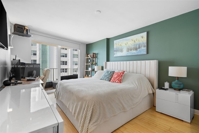 1228 W Ave Unit 704, Miami Beach, FL 33139 - bedroom featuring light wood-style floors