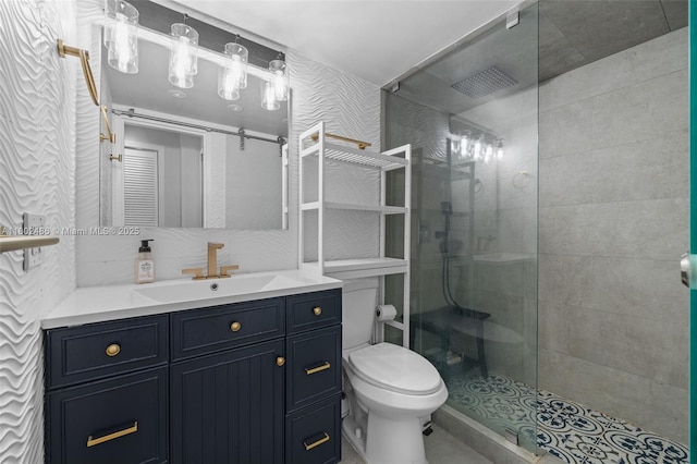1228 W Ave Unit 704, Miami Beach, FL 33139 - bathroom with toilet, walk in shower, and vanity
