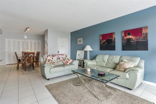 5601 Collins Ave Unit 615, Miami Beach, FL 33140 - living room with tile patterned flooring