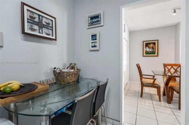 5601 Collins Ave Unit 615, Miami Beach, FL 33140 - dining area featuring light tile patterned flooring