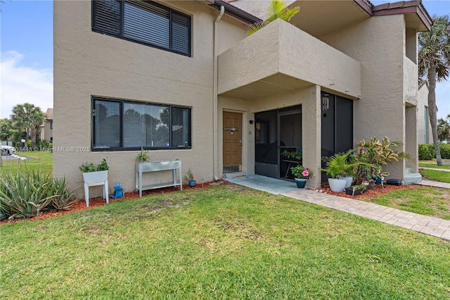 1145 N Shannon Unit 39, Indialantic, FL 32903 - view of front of house featuring stucco siding and a front yard