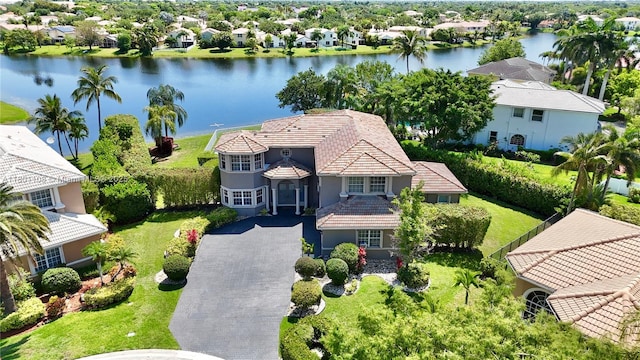 5081 NW 120th Ave, Coral Springs, FL 33076 - aerial view of residential area featuring a nearby body of water