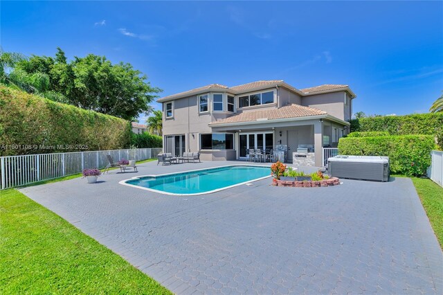 5081 NW 120th Ave, Coral Springs, FL 33076 - view of swimming pool featuring an outdoor living space, a patio area, and a fenced backyard