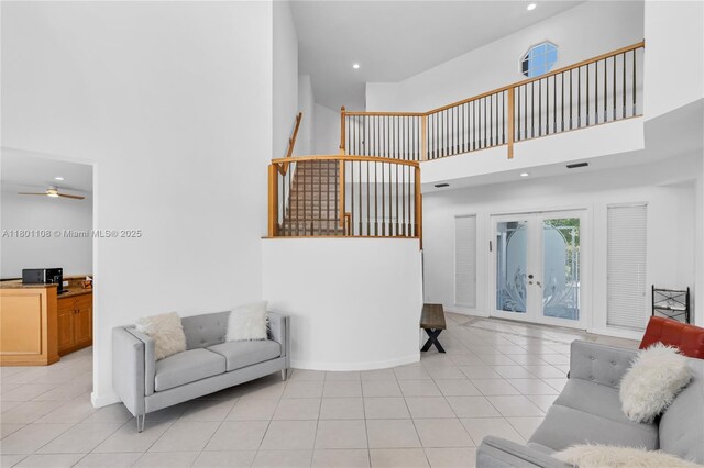 5081 NW 120th Ave, Coral Springs, FL 33076 - living area with a towering ceiling, ceiling fan, light tile patterned flooring, french doors, and recessed lighting
