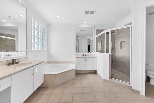 5081 NW 120th Ave, Coral Springs, FL 33076 - bathroom with crown molding, a stall shower, a bath, tile patterned flooring, and two vanities