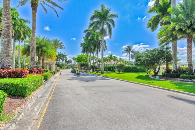 5081 NW 120th Ave, Coral Springs, FL 33076 - view of asphalt street featuring curbs