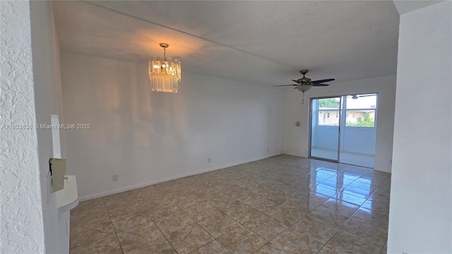 spare room with a chandelier and ceiling fan