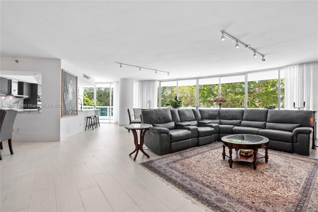 2127 Brickell Ave Unit 502, Miami, FL 33129 - living room with rail lighting