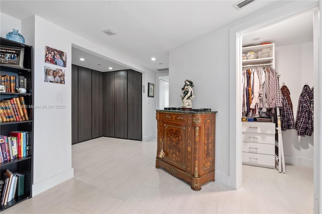 2127 Brickell Ave Unit 502, Miami, FL 33129 - hallway with baseboards and recessed lighting