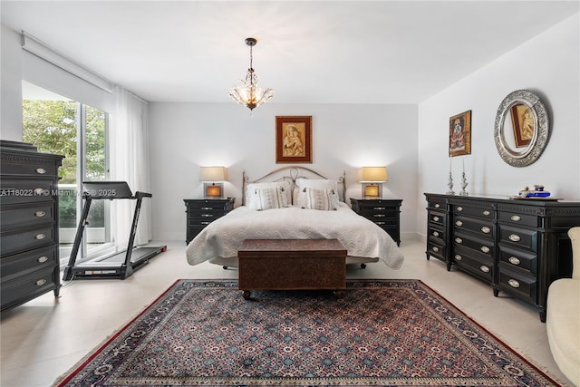2127 Brickell Ave Unit 502, Miami, FL 33129 - bedroom with a chandelier and baseboards