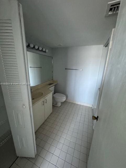 4724 NW 97th Ct Unit 87, Doral, FL 33178 - bathroom featuring tile patterned flooring, vanity, and toilet