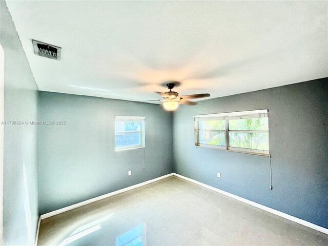 3135 SW 64th Ave, Miami, FL 33155 - empty room with a ceiling fan and baseboards