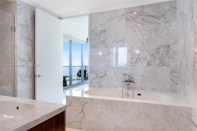15701 Collins Ave Unit 3201, Sunny Isles Beach, FL 33160 - full bathroom featuring a bath, vanity, and tile walls