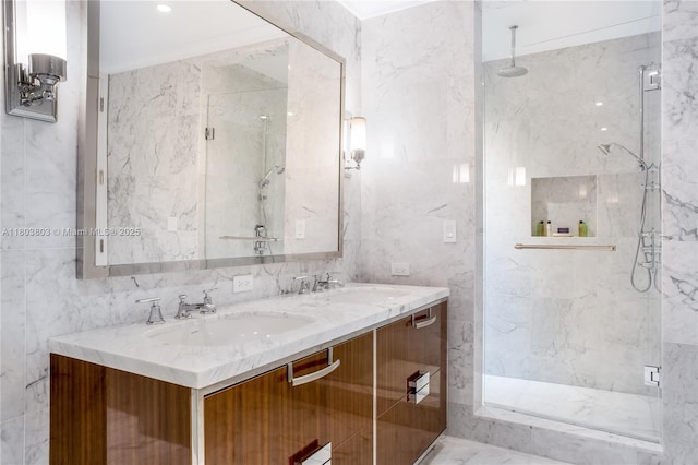 15701 Collins Ave Unit 3201, Sunny Isles Beach, FL 33160 - bathroom with a marble finish shower, tile walls, and double vanity