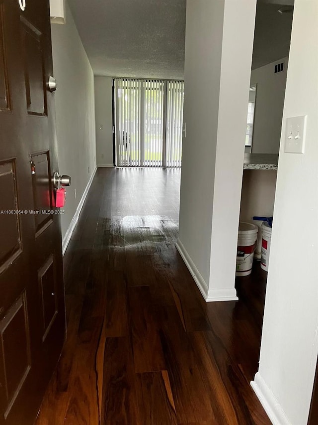 203 Lake Pointe Dr Unit 108, Oakland Park, FL 33309 - hall with wood finished floors and baseboards