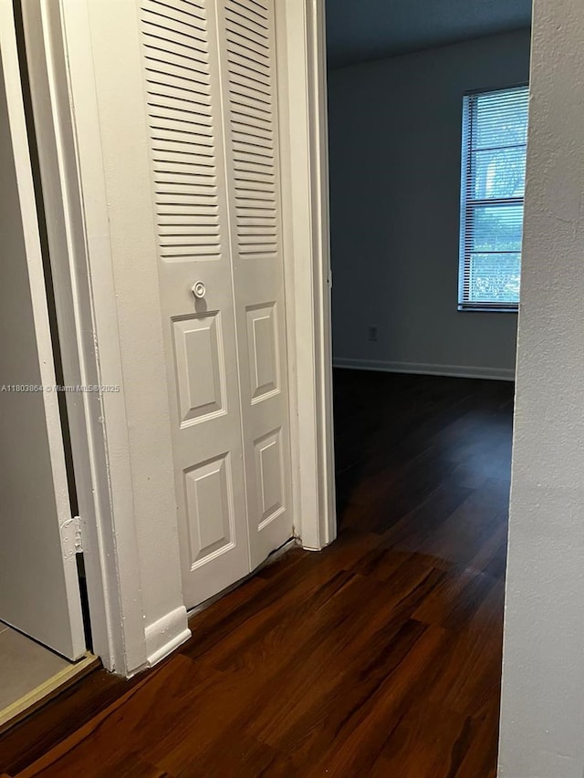 203 Lake Pointe Dr Unit 108, Oakland Park, FL 33309 - corridor with dark wood-type flooring