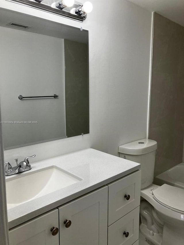 203 Lake Pointe Dr Unit 108, Oakland Park, FL 33309 - full bathroom featuring vanity and toilet