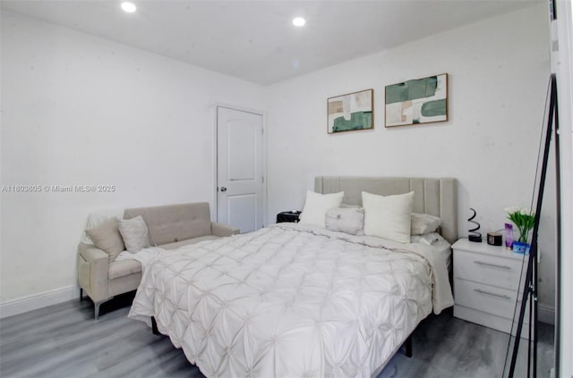 7917 Kismet St, Miramar, FL 33023 - bedroom featuring wood finished floors, recessed lighting, and baseboards