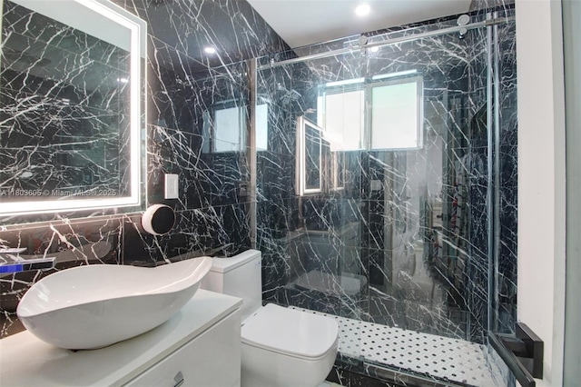 7917 Kismet St, Miramar, FL 33023 - full bathroom with tile walls, vanity, a marble finish shower, and toilet