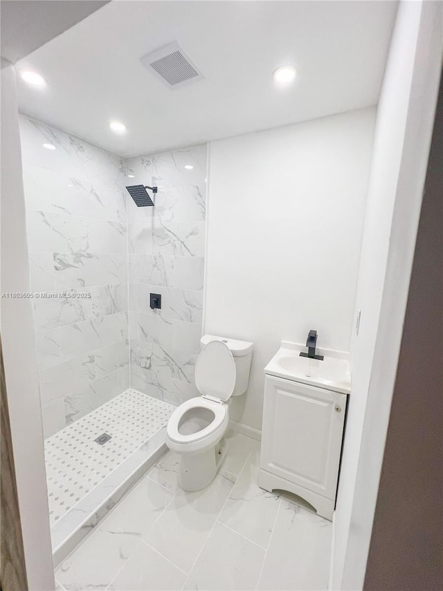 7917 Kismet St, Miramar, FL 33023 - full bath with recessed lighting, a shower stall, marble finish floors, toilet, and vanity