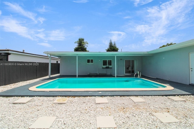 7917 Kismet St, Miramar, FL 33023 - view of swimming pool with a fenced backyard and a patio