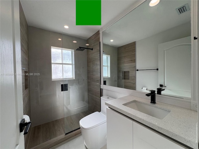 16247 SW 46th Ter, Miami, FL 33185 - bathroom featuring toilet, tiled shower, vanity, and recessed lighting