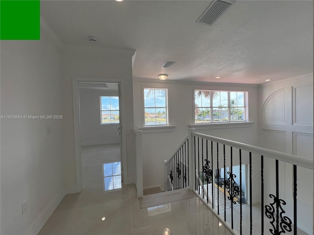 16247 SW 46th Ter, Miami, FL 33185 - staircase with crown molding, tile patterned flooring, baseboards, a textured ceiling, and recessed lighting