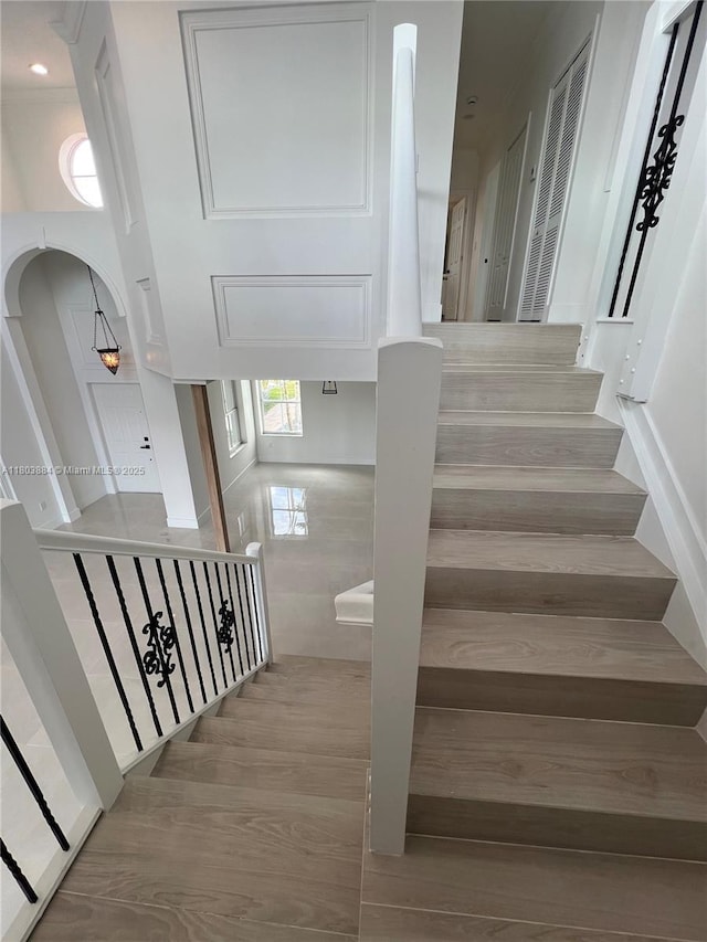 16247 SW 46th Ter, Miami, FL 33185 - stairway with arched walkways and wood finished floors