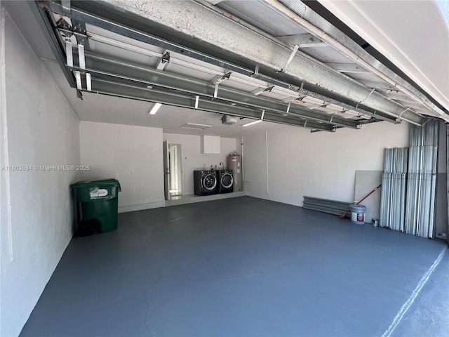 16247 SW 46th Ter, Miami, FL 33185 - garage featuring washer and clothes dryer, electric water heater, and a garage door opener