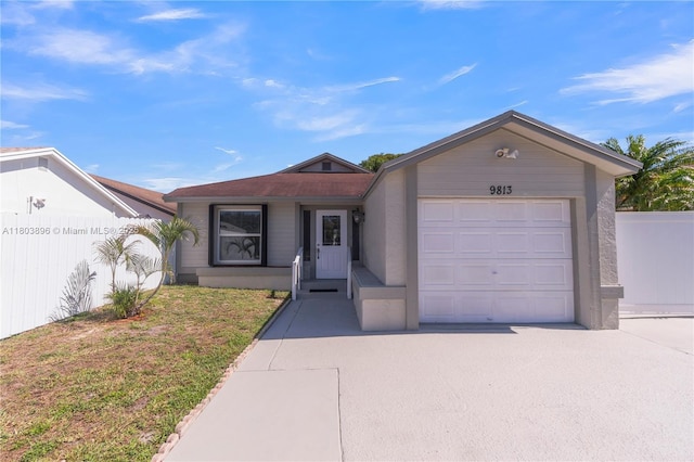 9813 SW 57th St, Cooper City, FL 33328 - ranch-style home with concrete driveway and a garage