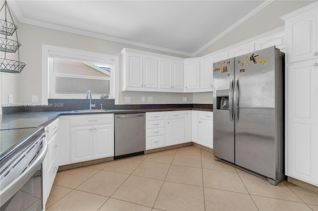 9813 SW 57th St, Cooper City, FL 33328 - kitchen with stainless steel appliances, a sink, crown molding, white cabinetry, and lofted ceiling