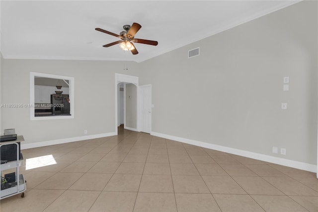 9813 SW 57th St, Cooper City, FL 33328 - spare room with crown molding, a ceiling fan, baseboards, and light tile patterned floors