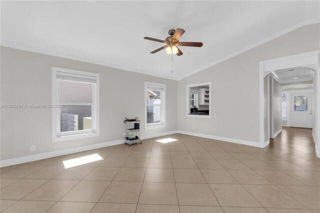 9813 SW 57th St, Cooper City, FL 33328 - empty room featuring crown molding, ceiling fan, vaulted ceiling, baseboards, and light tile patterned floors