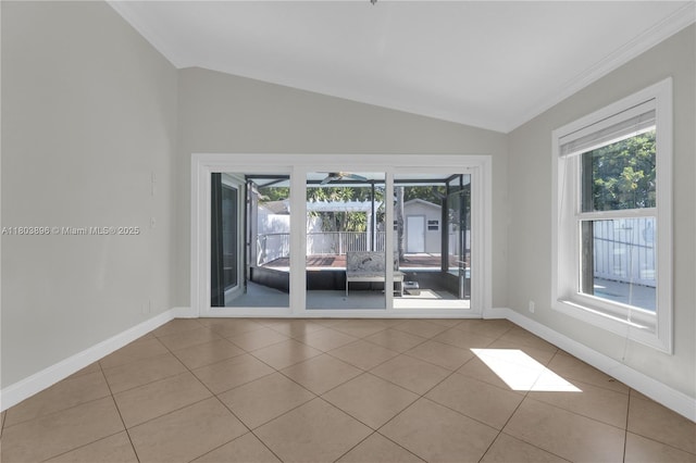 9813 SW 57th St, Cooper City, FL 33328 - unfurnished room with vaulted ceiling, healthy amount of natural light, baseboards, tile patterned floors, and crown molding