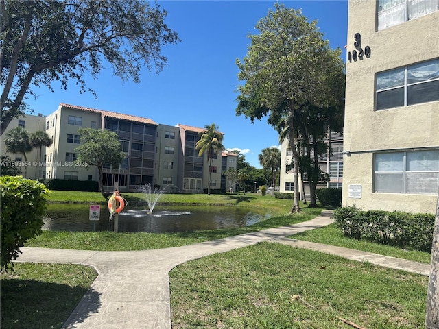 1820 N 81st Ave Unit 3310, North Lauderdale, FL 33068 - view of home's community with a yard and a water view