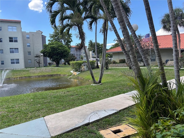 1820 N 81st Ave Unit 3310, North Lauderdale, FL 33068 - surrounding community featuring a yard and a water view