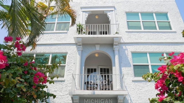 1618 Michigan Ave Unit 26, Miami Beach, FL 33139 - property entrance featuring stucco siding and a balcony