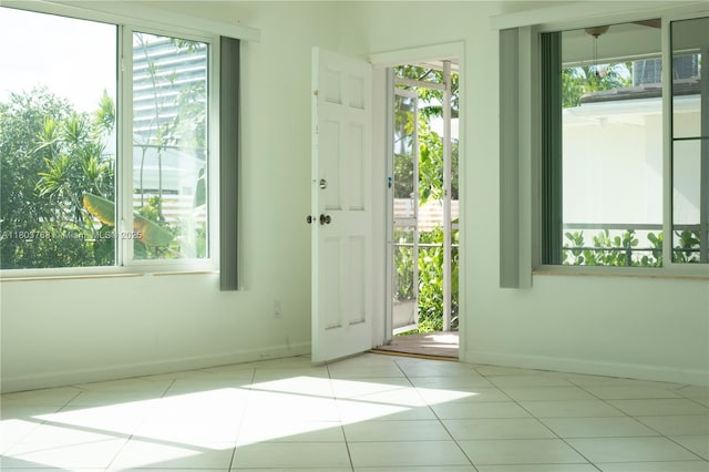 8851 Byron Ave, Surfside, FL 33154 - doorway to outside featuring tile patterned floors