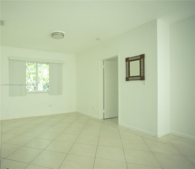 8851 Byron Ave, Surfside, FL 33154 - empty room with baseboards