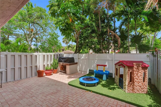 16465 NE 26th Ave Unit 18, North Miami Beach, FL 33160 - view of patio / terrace featuring a fenced backyard