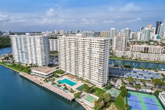 300 Bayview Dr Unit 812, Sunny Isles Beach, FL 33160 - drone / aerial view of a view of skyline, a pool area, and a large body of water