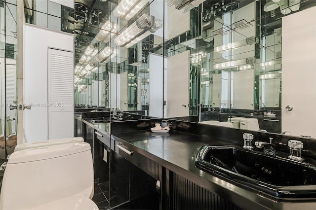 300 Bayview Dr Unit 812, Sunny Isles Beach, FL 33160 - full bathroom featuring toilet and double vanity