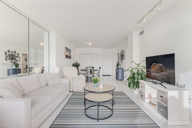 300 Bayview Dr Unit 812, Sunny Isles Beach, FL 33160 - living room with track lighting