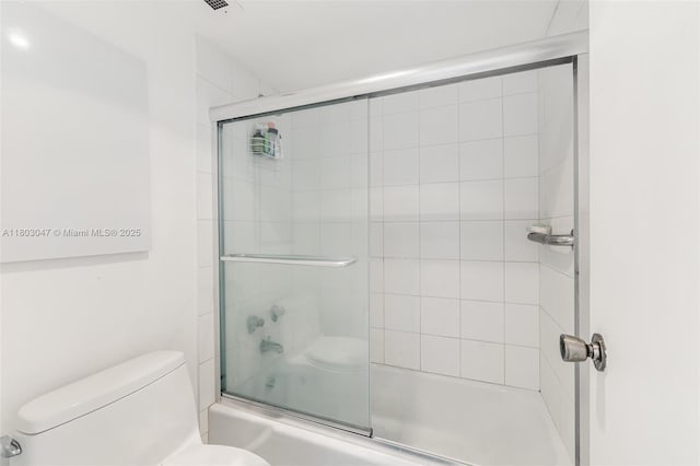 300 Bayview Dr Unit 812, Sunny Isles Beach, FL 33160 - bathroom with enclosed tub / shower combo and toilet