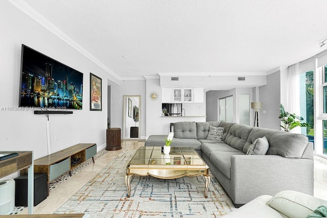 275 NE 18th St Unit 306, Miami, FL 33132 - living room with ornamental molding, light marble finish flooring, and a textured ceiling
