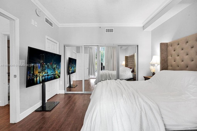 bedroom with ornamental molding, wood finished floors, access to outside, and baseboards
