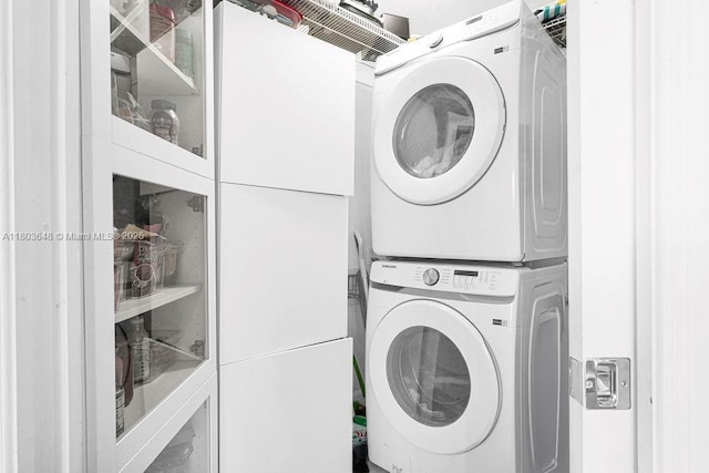 275 NE 18th St Unit 306, Miami, FL 33132 - laundry area with stacked washer / drying machine