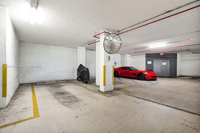 275 NE 18th St Unit 306, Miami, FL 33132 - parking garage with concrete block wall